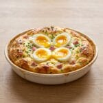 Omelette soufflée au jambon et œuf mollet au four
